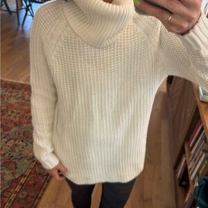 Classic white turtleneck sweater